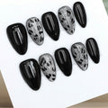 Black leopard chrome nails