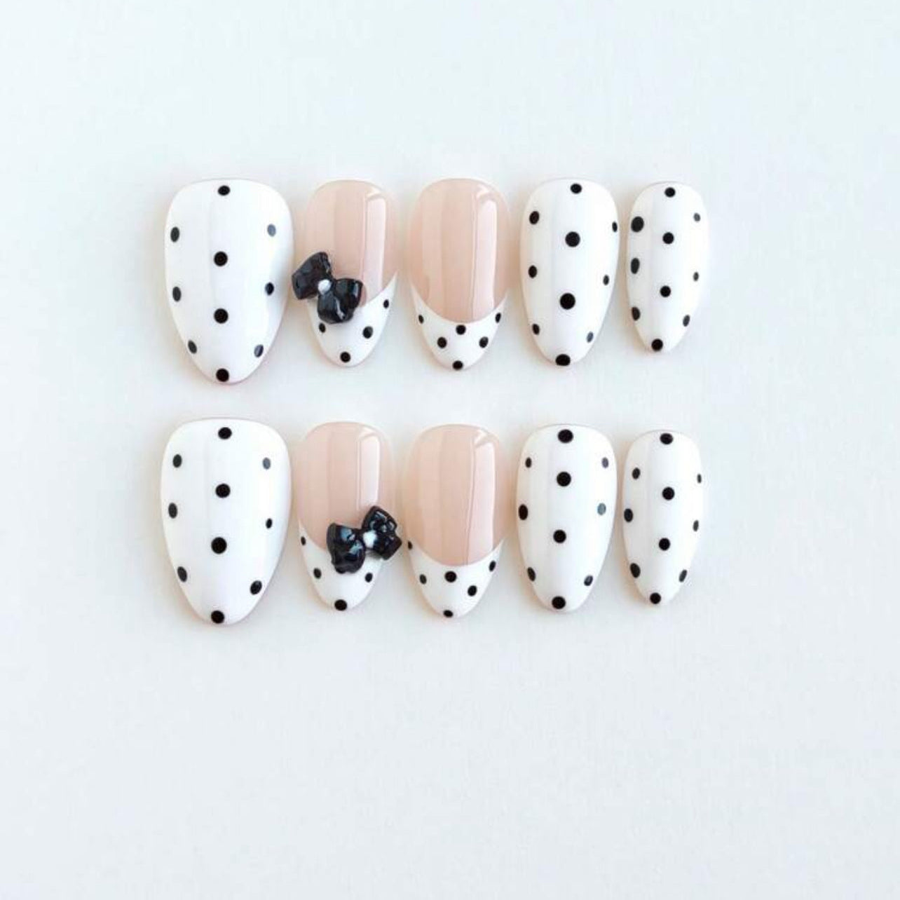 Bow polka dot nails