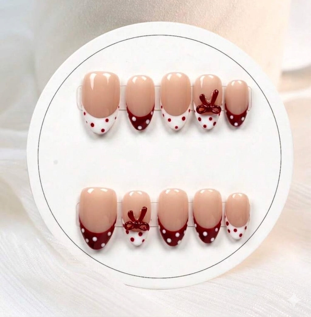 Bow polka dot nails