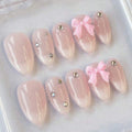 Rhinestone bow nails